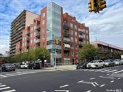 The building in downtown Flushing, short walk distance to Main St. convenience to all. This duplex 2BR & 2Bath condo, with open kitchen, hard wood floor, washer and dryer in the unit and 2 balconies. Building has doorman 9;30am to 10;00 pm.