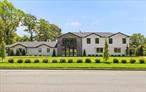 Embody the beauty of modern living in the desirable Gates of Woodbury. This 5000 square foot home has been meticulously rebuilt from the ground up, radiating perfection in every detail. As you step inside, custom European doors invite you into a grand 2-story foyer, setting the stage for the exquisite interior. The top-of-the-line gourmet kitchen is a chef&rsquo;s dream, featuring marble countertops and backsplash, a double dishwasher, walk-in pantry, coffee/wine bar, and an oversized island. Designed for seamless indoor-outdoor living, the residence effortlessly flows to the backyard oasis through expansive accordion doors. There, a covered porch, summer kitchen, gunite pool, fire pit, and a stylish bar lounge offer endless opportunities for hosting gatherings and creating lasting memories. Enjoy panoramic views of the magnificent property from your choice of two balconies. With primary suites on both floors and a myriad of additional details too numerous to list, this dream house is ready for you to move in and make it your own. **(Front & Backyard will be complete within 30 days)