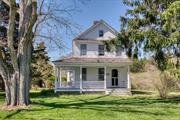 Beautifully preserved with many original details, intact turn of the century Farmhouse set on 1/2 acre with two original accessory structures and mature plantings. Three bedrooms, 1.5 baths, wrap-around porch, updated cedar shake roof, updated kitchen appliances, charming sunny mudroom, hard wood floors, original woodwork, and moldings. Large private rear garden that backs onto 36.5 acres of preserved walking trails with access to Dam Pond. Close to public beaches, State Park, East Marion Country store, Jitney stop to NYC and Greenport Village. Sound beach rights to Trumanâ€™s Beach.