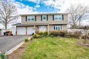 Harborfields School district 6, This Splanch home offers a spacious Entrance foyer, 4 Bedrooms, 3 full Baths, Living Room, Formal Dining Room, Family Rm with sliders to rear fenced backyard, Mud Room& laundry with side door entry. 2 car garage with interior entrance. Wall outlets all replaced and updated 200 amp electric. Gas heat, 4 yr burner+ hot water, windows replaced from original, roof updated in 2013, IGS 9 zone, extra-large basement. Cesspool replaced 5 yrs. alarm, bring your vision, house Needs TLC ! Has many possibilities. Greenlawn water district. Close to school, shopping, public transportation.