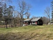 Located just off the Elm Hollow Brook, which feeds into the Willowemoc River. Sits this three bedroom home tucked in off the road. A nice retreat that is not off the beaten path. There is a small pond in the backyard between the house and the brook. A newly renovated bathroom, with an unfinished basement for more options. Located less than five minutes from Livingston Manor as well as Roscoe, two hours from NYC and just a few minute drive the the Catskill Fly Fishing Museum. Additional Information: HeatingFuel:Oil Above Ground,