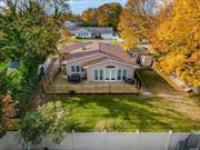 Finally a place to call home! Welcome to 315 N. Long Beach Rd, a unique styled ranch home on a .25 acre lot that has a tremendous amount of living space. Beautifully situated in Rockville Centre Village. This lovely home has over 2000 sqft with 4 bedrooms and 2 1/2 bathrooms. As you make your way inside, you&rsquo;ll enter upon an open space living room and formal dining room filled with natural sunlight throughout. Further back, you&rsquo;ll find a large family room with high ceilings, heated floors and access to your backyard oasis. Each bedroom has its own heating zones for your own personal setting. Prepared to be WOW with this stunning bathroom, equipped with a 6ft heated Jacuzzi, radiant floor, and standup shower. The kitchen has an ample amount of cabinets and countertop space and siting area. It&rsquo;s fully equipped with a commercial grade Garland 6 burner stove and Wolf range hood. Make your way downstairs to a beautiful basement area. This additional space can be used as a family room, home office and or gym the choice is yours! The basement area has ample amount of closet space, half bathroom, laundry room, storage area and new windows.  This exquisite property has all the key features you&rsquo;ve been looking for in a home. Ranch with a huge basement, New Roof, New Luxury Siding and Gutters. Designed with Radiant Floors, High Ceiling, Hardwood Flooring, 5 Heating Zones, Central Air with a New Compressor, 50 gallon water tank, 6ft Heated Jacuzzi, Carrara Marble Bathroom, Triple Water Filter System, Updated Electric with double panels, 360 degree Sprinkler System with rain sensors, Circular Driveway, 2-Car Garage, Wrap-Around-Deck, Private Backyard and so much more added features.  This home is ABSOLUTELY a game changer, move in condition, great location, near schools, golf course, LIRR, parkways and shopping. Call today for a private viewing.