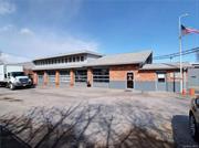 High-traffic mixed-use/ industrial building located just off Albany Ave in Kingston. The building measures about 15, 000 square feet on the first floor with a large 2-bedroom apartment on the second floor. Prime location offering municipal sewer, water, and natural gas with ample parking for 20+ vehicles. There is a loading dock with multiple overhead doors and access points. The building is set up so it could be easily divided into several work spaces and additional income. The building has 3-phase power and is fully sprinkled. There is a loading dock in the front and 5 overhead electronic doors measuring 10 x 12 ft. with +/- 15 ft. ceilings through most of the building. There is a large office/ reception area in the front and a two-bedroom apartment on the second floor. The property is currently owner-occupied. Business is included in the sale and the priority can be sold turn-key or vacant.