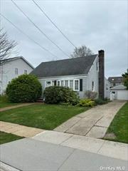 South of Merrick Rd. Flood Zone X. Rear dormer. First floor extesion. Detached Garage. Will not last!!