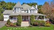 Fabulous 4 BR, 2.5 Bath, Victorian styled Center Hall Colonial in Harborfields is majestically nestled at the end of a cul de sac. This custom built home offers a spacious layout with formal entry and high ceilings. Thoughtfully designed with custom details throughout. Enjoy spectacular entertaining space both inside & outside. Amazing features include an expansive wrap around porch, private yard area with in ground pool & large patio area, pickleball/sport court plus so much more! Additional features include Gas heat, Central Air Conditioning, attached two car garage, walk up attic with high ceilings & loads of storage and full basement. Harborfields SD#6 , Close to Village, Shopping & Transportation. Must see to appreciate all the home has to offer!