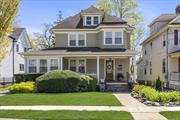 This meticulously maintained 1906 Victorian is the perfect combination of old-world charm and modern comfort. Take a seat on the inviting covered front porch before walking into the beautiful entry foyer. Prepare to be transported back to an era where attention to detail is second to none. Original woodwork is around every corner, from the oak paneled staircase to the ornate moldings and coffered ceilings. The amazing mosaic parquet floors ties it all in. Entertain with style in the large formal dining room that has original pocket doors separating it from the living room. Stay warm with the gas stove thats in the side den area. The updated kitchen has solid oak cabinets, granite counters and modern appliances. The full bath and main level laundry room completes the first floor. The second floor has 4 bedrooms, a full bath and access to a large fully insulated walk up attic. Sleep in comfort with CAC in each bedroom. The 140 ft deep manicured property creates an atomsphere for gatherings and relaxation with a lovely deck off the back of the house. The long driveway and two car garage adds ample parking and a rear shed offers storage for tools and outdoor equipment. Gas heat, 1st layer roof, vinyl windows are just some of the upgrades. Low taxes and private RVC electric. Located near LIRR and RVC town.