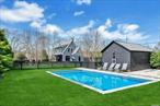 This iconic North Fork farmhouse with heated saltwater pool has been meticulously renovated and updated with attention to detail. The home exterior features a new cedar roof, Boral siding, and copper gutters. The windows and French doors have been replaced with high-quality Anderson products, ensuring energy efficiency and durability. Inside the house, natural light fills the space, creating a bright and inviting atmosphere throughout. The spacious living room includes an exquisite stone fireplace. The kitchen has been completely transformed with new appliances and a stunning wood block countertop. The primary bedroom is a true oasis, with an en suite design that includes a hex black marble shower with beautiful mahogany trim. Stepping outside, the backyard is a half-acre haven, fenced with designer Shou Sugi Ban burnt cedar horizontal planking. It offers privacy and a sense of tranquility. The landscape has been thoughtfully designed and planted creating a lush and inviting environment. Highlights include a a Himalayan birch forest, a blueberry warren, and a wildflower meadow.  Additional amenities include an oversized deck, outdoor shower and a garage with plans to convert to a pool-house. The location is highly convenient, with Love Lane&rsquo;s shops and restaurants, as well as the LIRR station, just a short distance away. For those who enjoy boating or spending time by the water there is a deeded kayak launch and a marina conveniently located across the street. And for beach lovers, the beautiful Bailie Beach is only two miles away, offering a stunning beach escape. This renovated farmhouse truly combines the charm of the past with the comforts of modern living. It is a unique and inviting property that offers a peaceful retreat while being conveniently located near amenities and recreational opportunities.