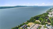 Spectacular, Hawaii level sunsets and unobstructed views of the Hudson River, the Manhattan skyline to the south and bridge to the north. The best and last lot with river views in this newer subdivision of homes. If you&rsquo;ve been wanting to create your dream home with a phenomenal view, close to the bucolic villages of Dobbs Ferry & Hastings on Hudson, this is your chance. Topographical survey, soil survey, phase 1 site work permit for excavation, site stability work, geogrid with integrated retaining wall and architectural plans included with purchase. Trees have been removed on the lower part of the slope. Retaining wall in place. Close to shops, restaurants, Metro-North and the Old Croton Aqueduct Trail.