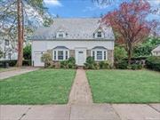 Welcome home to this 4-bedroom 2.5-bath colonial with slate roof set upon a 70 x 100 property on a beautiful tree-lined street. The sparkling hardwood floors greet you as you enter this traditional fieldstone colonial. A spacious formal living room with a wood-burning fireplace and built-in cabinetry receives ample sunlight and leads out to a cozy screened-in porch overlooking a manicured private yard. A formal dining room boasts a large bay window and leads into a cherry wood kitchen, powder room, and access to the yard. The second level boasts a spacious primary bedroom, an extra-large hall bath, 3 additional bedrooms, and a second full bath. A full basement with a laundry area and tons of storage is ready for your personal touch. Other amenities include an attached 1-car garage, inground sprinklers, an above-ground oil tank, gas for cooking, and a pull-down attic for storage. With its proximity to village parks, schools, shopping, public transportation, and highways, this home will not last.