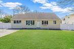 The Best of Both Worlds! This Split Level Home Is Located in Patchogue but Zoned for Award Winning Bayport-Blue Point School District. The Lower Level Features Vinyl Flooring Throughout the Living Room/Kitchen Combo and Bedroom. The Recently Renovated Full Bathroom Boasts Porcelain Tile, a Stand-up Shower, and Laundry. A Separate Outside Entrance Makes This Perfect for Mom. The Main Level Features an Eat-in-Kitchen with Ceramic Tile Floors, Granite Countertops, and Stainless Steel Appliances. The Living Room and Dining Room Highlight Newly Refinished Beautiful Jacobean Hardwood Floors and 2 Closets for Storage. The Upper Level Has Stairmaster Carpet and Consists of 3 Bedrooms, a Hallway Closet and 1 Full Bathroom With a Skylight and Newer Vanity. This Home Also Features PVC Fencing and a Brand New Hot Water Heater. Your New Home Awaits!