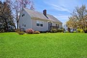 Welcome to your own slice of heaven on 2.5 acres, a warm, cheerful, light-filled cape cod with open floorplan on first floor which includes kitchen with breakfast bar, open to a 12 x 24 ft family room which occupies the length of the house in the rear. A generous pantry area is just off the kitchen for storage. Look out through large windows onto your expansive rear property while enjoying your coffee in the family room area. Bedroom and bath on main floor, full bath and lovely living room with fireplace. Upstairs has two more large bedrooms and another full bath. An open deck is off the side of the house. The 2 car garage has been converted to office space/studio for another 528 sq ft. REMEMBER TO LOOK INSIDE GARAGE STUDIO! A large shed can contain all your gardening equipment. there is ample parking in the wide driveway. Many mature plantings on your sweeping 2.5 acre property make this a peaceful oasis all your own, yet minutes to schools, shopping and major routes.