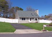 This home is in the Old Westfield Area of Selden. New laminate flooring. Full, partially finished basement, ready to be transformed into your personal retreat or entertainment hub. This Home features a 150-amp electrical service with 1 Year Young boiler that promises warmth and efficiency! The integrity of the home is assured with a roof, gutters, and skylights that are only five years young, accompanied by the added security and aesthetic of a PVC front fence that was installed approximately three years ago. Zoysia grass adorns the front yard. Property is .40 of an acre.