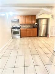 Large Lower Level apartment with Spacious rooms. Gas, heat, and hot water included. One block to boardwalk, A train, and shops. Application and references required.