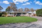 Welcome to this beautiful, spacious 4-bedroom, 3-bath expanded ranch nestled on just shy of a flat acre in Ronkonkoma. This home underwent a complete transformation in 2004, taken down to the studs, with meticulous attention to detail. From new sheetrock, plumbing, and electric to the replacement of the roof, every aspect was carefully considered.Anderson wood windows, skylights, and crown molding throughout add a touch of elegance to every space. The kitchen boasts solid wood cabinets, granite countertops, and stainless steel appliances and reflect pride of ownership. Brazilian Cherry hardwood floors flow seamlessly through the dining and living areas, enhancing the home&rsquo;s charm.The primary bedroom is a sanctuary, featuring cathedral ceilings, a luxurious en suite bathroom, and a massive walk-in closet, complete with a separate zone for heat. The legal extension overlooks the park-like yard, flooded with natural light, perfect for an in-law suite or guests, with a full bath, efficiency kitchen, and vaulted ceilings.Step outside to the huge backyard, offering space for a massive pool or outdoor activities. Two sheds provide plenty of storage, while the circular driveway offers convenience and ample parking.Notable features include a 5-year-old water heater, a 9-year-old 3-ring cesspool, a Roth oil tank, 6-zone in-ground sprinklers in the rear of the home, 4 zones of heat, 2 split system HVAC units, several wall AC units, and a very large full basement with indoor access and bilco doors, offering endless possibilities.Conveniently located just 1.2 miles from the Ronkonkoma train station and 8 miles from Islip Airport, this home offers easy access to major highways, shopping, restaurants, and parks all while providing a peaceful retreat from the hustle and bustle of everyday life. Truly a magnificent home!