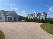 Relaxing water views from this canal front Dune Road home with 20 x 40 heated gunite pool and spa in the charming village of Quogue. 2025: July 1- July 15 @$40, 000; August 17- Sept 3 @$42, 000 & Also June or September (2 wk minimum). This immaculate home includes 5 bedrooms; 3 full baths plus 1 half bath, spacious and airy living room with wood-burning fireplace, fully equipped kitchen with large island & open concept dining area. Family and guests enjoy an additional family/living area and covered deck on the first level. A spacious stone patio and a heated in-ground pool with waterfall spa and outdoor shower are perfect for relaxing after a day on the beach. Multi-level decks offer great views of both sunrises and sunsets. Located just a short distance from the shops & restaurants in both villages of Quogue and Westhampton Beach.,