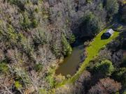 This hidden gem of 79 acres, consist of two contiguous parcels; 29 acres (SBL#26.-1-45) in the Town of Delaware and 50 acres (SBL#2.-1-19) in the Town of Cochecton, NY. The untamed beauty of the land and its 360-degree bucolic views promises serenity with privacy, making it the perfect canvas for your dream house nestled in the picturesque Catskill mountains. Just pure tranquility with lush foliage and a variety of fauna wildlife on a lovely country road. The topography is tiered, mostly wooded with open level areas and rocky outcroppings. The property lends itself well to a home site or sites to build your family compound of homes! The property has been family-owned land for over 50 years. For the single family home builder to reduce taxes - one might consider putting the 50 acre parcel in a Land Conservation easement and or the Forestry Program (log the property)! This incredible property has everything you&rsquo;ve been looking for - a pond, small barn with electric, seclusion, privacy yet close to everything. The Delaware River is a short distance away, as are the neighboring Communities of Barryville, Eldred, Highland Lake, Bethel, Callicoon and Livingston Manor. Close by is incredible fishing, kayaking, hiking, horseback riding, skiing, shopping, Breweries, Distilleries & Wineries, Bethel Woods Center for the Arts, Resorts World Casino, and Farmer Markets!! ATTENTION DEVELOPERS - This could be an amazing property for a subdivision with over 2, 675 feet of road frontage on New Turnpike Road!!! Come take a look, the property offers great views and has tiers for multiple home sites on so many levels. This property is within 2 hrs from NYC.