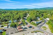 Don&rsquo;t let this exceptional opportunity slip away â€“ seize the chance to acquire this meticulously maintained, two-unit marvel in the heart of Kerhonkson! Nestled at the base of the picturesque Shawangunk Ridge, this property boasts a seamless blend of commercial and residential spaces, perfectly primed for savvy investors or aspiring entrepreneurs. Embrace the allure of small-town charm with a touch of sophistication as you step into the 2, 269 square foot business premises, once a cherished local hotspot. The longstanding establishment was thoughtfully crafted and operated by a dedicated family, and is poised to deliver prosperity to its fortunate new proprietor. A thirteen-seat bar, complemented by seven impeccably matched tables, awaits patrons to indulge in gatherings once again. Beyond lies a sprawling outdoor patio, beckoning guests to savor al fresco experiences, while a fully equipped kitchen stands ready with an array of top-of-the-line appliances, including multiple refrigerators, freezers, and a commodious walk-in cooler. Above the bustling business is a well-appointed two-bedroom apartment, accompanied by a generously sized attic â€“ currently yielding steady rental income through a reliable month-to-month tenant. Whether seeking a lucrative investment opportunity with a proven track record or envisioning boundless possibilities for expansion and innovation, this property is the epitome of potential. Seize your chance to embark on an extraordinary investment journey â€“ your future success starts here! Additional Information: HeatingFuel:Oil Above Ground,