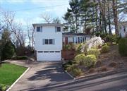 Welcome to this captivating home, set amidst a private forest-like yard. Inside, discover a spacious living room with a cozy fireplace, a dining room perfect for hosting gatherings, and a kitchen boasting ample cabinet space. Four bedrooms, including a master suite, offer comfort, alongside two and a half baths for convenience. A partial basement provides extra storage, Park with ease in the two-car garage. Enjoy the Florida room and the tranquility of the yard with its serene fish pond. low taxes ! Welcome to your peaceful retreat!