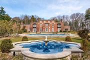 Magnificent Brick & Limestone Gold Coast Mansion Set On 5.41 Acres w/Waterview of Lake Francis. Renovated w/Gourmet Kitchen & Baths, 12&rsquo; Ceilings, Elliptical Stairway, Mahogany Library, 8 Fireplaces, Bordering 24 Acre Preserve.CAC. Pool and Tennis Court.