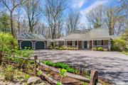 Escape to 60 Shutter Lane, an enchanting shake-shingle retreat that provides the perfect balance of indoor and outdoor living. This renovated farm ranch offers a sun-filled great room with a cozy fireplace, updated kitchen with mudroom and home office with radiant floors, first-floor primary suite with new bathroom also with radiant floors, three bedrooms and two full baths in total, this home offers ample space but also has opportunity for a grand expansion. Step outside onto the rear deck and take in the sights and sounds of the nearby nature preserve and bird sanctuary. The wildlife and verdant surroundings create a tranquil and picturesque setting on over two-and-a-quarter acres. The property boasts towering trees, and a two-car carriage-style garage, adding to its charm and appeal. Just a short distance away, you&rsquo;ll find the historic Sagamore Hill, the former home of President Theodore Roosevelt, offering a glimpse into the past. Additionally, Oyster Bay Village is nearby, providing a waterfront center, marina, quaint village shops, dining options, and a railroad station.