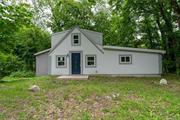 New Paltz! Looking for something different? This newly renovated chalet home is sitting on 8 acres of privacy! Surrounded with nature, this home can be used all year round, or for a cool getaway! Easy to move into, this home features a new wood kitchen with stainless appliances and granite countertops,  renovated baths, new flooring, new siding, new roof, mostly new windows, new electrical, plumbing, new HW heater and more!