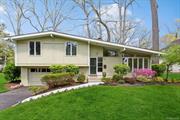 Welcome to Prospect Park...one of the premier neighborhoods in White Plains. This beautifully updated and maintained contemporary split has an abundance of natural light. The first level features a large living room with a wall of windows, recessed lighting, wood burning fireplace, open concept dining/recessed lighting with glass sliders to the patio and large yard. The kitchen has granite counters, recessed lighting and new LVP flooring. A few steps up to the second level is the primary bedroom with two exposures and entry to a newly updated full bath. There are two additional bedrooms, and an updated hallway half bath that has dual entry to the full bath. The lower level has a family room, recessed lighting, new LVP flooring, with additional home office space, door to yard, garage entry, laundry and utilities. The whole house interior has been freshly painted, and wood floors refinished (2024). The patio and parklike property are perfect for outdoor entertaining. Additional updates include roof (2020), boiler (2022), hot water heater (2023), driveway (2024), garage door opener (2024). Enjoy all of the wonderful amenitites that White Plains has to offer, such as great restaurants, shopping, entertainment and a fast commute to Manhattan.