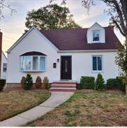 THIS EXPANDED CAPE HOME FEATURES LARGE BEDROOMS, OPEN FLOOR PLAN FOR PERFECT FOR ENTERTAING, FAMILY ROOM WITH VALTED SEALING, FINISH BASEMENT WITH OSE, GARAGE, KIICHHEN WITH GRANITE COUNTERTOPS.