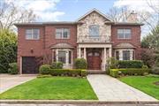 Nestled on a serene cul-de-sac minutes from shops, this grand all brick center hall colonial, built in 2008, seamlessly blends timeless elegance with modern luxury. Featuring soaring high ceilings, marble flooring and bathrooms, and radiant heat throughout, attention was paid to every detail of this home inside and out. The lush outdoor spaces include bluestone patio and walkway, fenced in backyard, outdoor electric and gas bbq hookup, and in ground sprinkler system. The main floor offers a cathedral double height entry foyer with coffered ceiling, a formal living room with marble gas fireplace, a dining room with separate butler&rsquo;s pantry, a state-of-the-art kitchen, den, first floor office/bedroom, attached garage, full bathroom and powder room. There are 5 spacious bedrooms and 3 full bathrooms upstairs, including a lavish master suite with a marble fireplace, two walk-in closets, and an en-suite bathroom with jacuzzi. The fully finished basement holds two additional bedrooms, full bathroom, massive play area, and laundry room. With over 2, 000 sqft of living space per floor, this gem won&rsquo;t last long. Make it yours today!