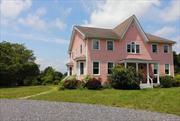 Spend the best part of summer at this spacious renovated home. Stunning Catskill Mountain and sunset views included! Situated on a cul de sac in a private quiet neighborhood, the main floor offers a spacious first floor primary suite, large eat -in kitchen that is open to the dining room, a vaulted living room with a wall of windows, two half baths, and a large laundry/mud room. Upstairs, you will find two wings on either side of the house - each with a full bathroom and two bedrooms - which are separated by a common area that can be used as an office, 2nd media room, or playroom. The property is on 12+ acres, with a beautiful inground gunite heated pool and spacious bluestone patio. Conveniently located 10 min from Red Hook & Tivoli and 20 min from Rhinebeck. Available for the months of June ($16K), August ($18K), and September ($13K).Tenant responsible for $3, 500 refundable security deposit, $300 cleaning fee, propane costs above $450, and 5% gross rental commission. Sorry, no pets allowed.