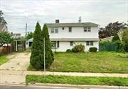 This detached home is situated in Levittown and now features 5 bedrooms 2 bathrooms. Situated on a spacious 6011 sq ft lot, the interior boasts 1, 879 sq ft, offering immense potential for customization or expansion into a luxury residence. Facing south, it features a mother-daughter home layout, with upstairs stairs leading to the backyard for added convenience. Complete with a in-ground swimming pool, it&rsquo;s directly opposite the school and offers easy access to transportation, shopping, making it an ideal choice for both living and investment purposes.