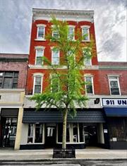 Almost 15, 000 ft. MIXED-USE Building in the Business District, Main St, City of Poughkeepsie. Offering 5-Levels of Rental Space. 2-Commercial, (5k ft. Bar/Cafe/Restaurant & 400 ft. Office/Shop) 3-Residential (Studio, 1-Bdrm, & 3-Bdrm). Centrally Located. Building offers Main Street Entrance and Rear Exit to Public Parking. Bar/Cafe/Restaurant has 2-Levels, w/2500 ft. on each level. More photos coming soon. Interested buyers must show Proof of Funds to see. Advance notice must be given for tenants. Appointments must be scheduled on ShowingTime. 48hrs Notice required for tenants, all units are occupied, except for Restaurant, which is listed For Rent. Please call for more information.