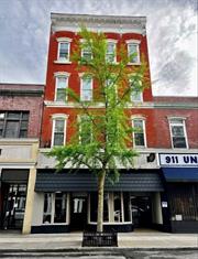 **Property Overview: Mixed-Use Building in Poughkeepsie** **Location**: Heart of Poughkeepsie, Business District **Total Size**: Approximately 15, 000 sq. ft. **Building Features**: - **5 Levels of Rental Space**: Offering a diverse mix of commercial and residential units. - **Main Street Entrance**: Convenient access for businesses and customers. - **Rear Exit**: Leads to shared public parking, enhancing accessibility. **Parking**: Public parking lot shared with local bars, restaurants, office spaces, and the Bardavon Theater, situated near the Civic Center and a hotel. **Commercial Units**: 1. **Bar/Cafe/Restaurant**: 5, 000 sq. ft. split across two levels (2, 500 sq. ft. each). 2. **Office/Shop**: 400 sq. ft. **Residential Units**: - 3 separate units consisting of:  - Studio  - 1-Bedroom Apartment  - 3-Bedroom Apartment **Additional Information**: - The restaurant unit is currently listed for rent. - All residential units are occupied. Advance notice is required for tenant showings (48 hours). - Interested buyers are required to provide proof of funds to schedule a tour of the property. - Appointments must be arranged through ShowingTime. **Contact Details**: Please call for more information or to schedule a visit. --- This property represents a unique opportunity for investors seeking a mixed-use building in a lively urban area with strong foot traffic and nearby amenities.