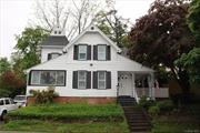 LOCATED IN THE HISTORICAL AREA OF POUGHKEEPSIE, THIS RECENTLY RENOVATED HOME WAITS FOR YOU! THIS HOME HAS CHARM, A CLASSIC BLACK AND WHITE COLONIAL EXTERIOR, WELCOMING WRAP AROUND PORCH AND PERRENIAL GARDENS ON EITHER SIDE OF THE STEPS! AS SOON AS YOU ENTER, YOU ARE MET WITH A BEAUTIFUL STAINED-GLASS WINDOW AND MUDROOM. THE 1ST FLOOR IS WONDERFULLY BRIGHT AND COZY, YOU HAVE A SPACIOUS KITCHEN WITH AN EXPANSIVE ISLAND, CUSTOM CABINETRY, QUARTZ COUNTERTOPS, EXPOSED BRICK, AND VIEWS OF THE YARD. BEAUTIFUL FRENCH DOORS WITH GLASS NOBS LEAD TO A ROOM THAT CAN BE A FORMAL DINING ROOM, DEN, OR OFFICE AND LEADS TO A 3 SEASON PORCH. THE LIVING ROOM OFFERS A WINDOW SEAT, PLENTY OF SPACE FOR ENTERTAINING, AND LEADS TO ANOTHER ROOM WITH NUMEROUS POSSIBILITIES, AS WELL AS ACCESS TO YOUR DRIVEWAY, SIDE STEPS, AND A WALKWAY TO THE YARD. UP THE STAIRCASE IS AN UP-TO-DATE HALL BATHROOM, 4 BEDROOMS WITH PLENTY OF CLOSET SPACE, A MASTER BATH, AND A VAULTED ATTIC WITH MORE LIVING SPACE! CALL NOW!