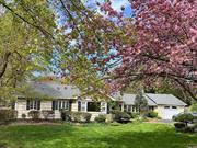 This renovated expanded ranch is perfectly situated on a flat, 1 acre, parklike property in North Greenlawn, Harborfields school district. Enter the spacious 4-car driveway with easy access to your home entrance. Inside, an open-concept, bright kitchen and den greets you with cathedral ceilings, skylights, and wood burning fireplace. The chef&rsquo;s kitchen with stainless steel Thermador appliances, granite counters and island makes for easy living and entertainment. Adjacent is the dining room and formal living room with wood burning stove and new mantle, richly adorned with crown moldings. The private quarters separated by a sliding barn door consists of two large bedrooms, a full bathroom, custom laundry room, and an additional expansive primary en-suite with cathedral ceiling and custom closet. The primary bathroom with floor-to-ceiling tile, glass-enclosed steam shower with granite bench, and private water closet provides both luxury and privacy .Heading down to the partially finished basement with egress windows, built-in cabinets, cedar closet, and full bath add additional recreational space or a perfect guest suite. Through the glass slider doors off the kitchen, head outdoors and relax in the backyard oasis. Cool off in the In-ground saltwater pool or entertain your your guests on the patio surrounded by professionally landscaped plantings. Just minutes away from library, schools, railroad, and the quaint village of Greenlawn, and nestled between the vibrant town of Huntington and charming town of Northport. Take a short ride to the beaches of Centerport, Vanderbilt Museum, or hiking trails to round out this property as a prime location of what Long Island has to offer!