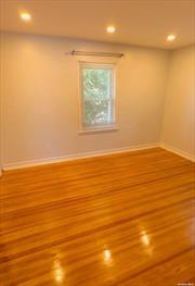 Recently updated one bedroom apartment in a two family house on the second floor. Full Eat-in kitchen, full bathroom, one big bedroom with wall to wall closets, and living/dining room combo. Freshly painted walls and new hardwood floors. Separate entrance with own foyer. Heat, gas, water included. Tenant responsible for electricity only. Close to LIRR, bus, shops, park, schools, and all amenities. Lots of street parking. Access to driveway parking too.