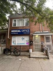 Medical Suite on the 1st floor with Apartment upstairs, Parking rear of building.