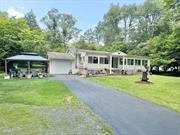 Welcome to 307 Beaver Lake Rd, a serene retreat in Livingston Manor that offers the opportunity to enjoy authentic country-charm living! This very well-maintained property is situated on a quiet road on close to 1.5 acres of land steps from Nimrod Lake, providing gorgeous water views. The spacious wrap-around sunroom is perfect for entertaining. The main level consists of three bedrooms, a living and formal dining area, and a kitchen with a breakfast bar. The finished basement is like a guest suite, neat and meticulous, with two additional sleeping quarters and a full bath. The roof was also replaced over the last five years, but the best part about this property is its proximity to Livingston Manor! In just a short ride, you can grab a coffee at Main St Farm Market Cafe with a view overlooking Willowemoc Creek and a glimpse of angling fly fishermen or be surrounded by the bustling vibrance of Main St, where many flock from all over (to what would practically be at your fingertips whenever you&rsquo;d like) to enjoy amenities such as Catskills Art Space, the many art galleries, antique, vintage, and fishing shops, restaurants with lovely cocktail bars, Catskill Brewery and renowned attractions such as Kartrite Indoor Waterpark, Resorts World Casino, Bethelwoods Center for the Arts and Mongaup Pond Campground! So, if you&rsquo;re looking for a peaceful place to call home that can sleep up to 10 people with a fun and exciting town nearby and easy access to and from Highway 17, this is the place for you! Call today to schedule a private showing!