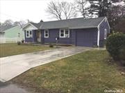 Half Hollow Hills SD. Excellent location, near LIRR (walking distance). Low taxes (under $10, 000/year). Lovely block in a safe, quiet neighborhood.
