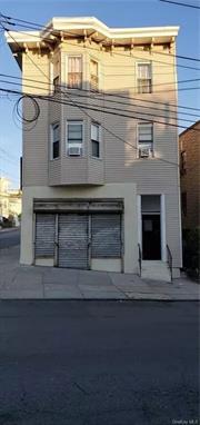 Investor&rsquo;s / Contractor&rsquo;s dream. Mix use ready for construction 3 floors property with two 3 over 3 apartments and laundromat with additional space on the first floor. Approved plans Additional Information: ParkingFeatures:2 Car Detached,