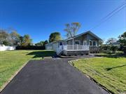 Do you like the beach, boating or just the sound of the ocean? This gem has it all. Renovated and tastefully done with that kick off your shoes! Hamptons feel. Beautiful new stone and earth tone green vinyl siding. Go inside and enjoy the living room with tall ceilings and natural sunlight. Your breakfast / coffee bar overlooking the new white shaker style kitchen. Nicely equipped with stainless steel appliances. Dining room / office that could be used as the third bedroom. Primary bedroom and second bedroom, laundry and new full bath. Nestled on a nice lot with a detached 2 car garage.