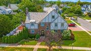 Located in the charming Village of Rockville Centre, this Tudor-style home boasts a colonial interior that seamlessly blends classic elegance with modern convenience. Situated within the Rockville Centre School District, with Wilson Elementary School just a stone&rsquo;s throw away. Spanning three levels, this move-in ready home, offers ample space with four bedrooms and three full baths. As you enter, you&rsquo;ll be greeted by the warmth of hardwood floors, enhanced by decorative moldings and raised panel walls. The gourmet kitchen is a chef&rsquo;s delight, complete with a breakfast area for casual dining. The formal living room exudes charm with a gas fireplace, ideal for cozy gatherings, while the spacious dining room sets the stage for memorable meals with family and friends. A den provides additional space for relaxation or entertainment. Ascending to the second level, you&rsquo;ll find a large ensuite bedroom, complete with a walk-in closet for added convenience, three additional bedrooms & full bath. The third level features a versatile bonus space, perfect for use as a den or office, flooded with natural light from skylights and offering ample storage, including a cedar walk-in closet. The lower level of the home is designed for recreation and functionality, boasting a spacious recreation room suitable for a gym or office space, along with a laundry room for added convenience. Step outside to the private patio, perfect for outdoor entertaining or simply enjoying some fresh air. Other notable features of this home include central air conditioning for year-round comfort, 200 Amp electric, a 2-car garage featuring Garagetek for organized storage solutions, and a multi-car driveway for ample parking. With its blend of timeless charm and modern amenities, this Tudor home offers a truly inviting and comfortable lifestyle for its lucky residents.