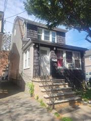 LOCATION, LOCATION Legal 2 Family in the Heart of Elmhurst Conveniently located near local buses & subway, parks, schools, Queens Center Mall & more! Great income Property. EASY TO SHOW !!