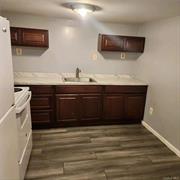 Recently renovated 1 bed 1 bath apartment with updated kitchen and bathroom. The apartment has brand new tile flooring, sheetrock, insulation, and paint. The unit features a private entrance and parking for 2 vehicles. Walking distance to Main St. shopping and NYC bus stop. Tenant pays heat and electric. Showings will start June 1. Please do not stop by the building and bother current tenants. All questions call broker. Thank you.