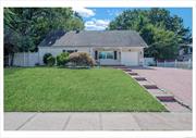 Introducing a Charming Cape Cod on a Tranquil Dead-End Street in Selden. This charming property boasts an ideal blend of classic design and modern comfort, making it a perfect fit for contemporary living. The stylish eat-in kitchen features all new Stainless steal Appliances, plenty of counter space and elegant cabinetry, a cozy sunroom with a gas fireplace, creating a bright and welcoming space year-round. New Flooring Throughout the home.