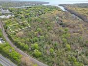 Prime Residential land in Eastport on Eastern Long Island. Combined (5) lots - 40, 000 Sq t. (.91 acres) of LEVEL and wooded land. Parcel(s) - Dist.: 200 Sec: 686 Block: 6 Lots: 2; 3; 4; 5 & 6. Located South of Montauk Hwy. Plotted on corner of Central Pl. and Madison St. (paper roads) for perfect 200 x 200 squaring. Adjacent utilities with nearby residences. Close to Hamptons with Ocean Beaches, Retail Main Streets and Seasonal Events. First time available in years after generational hold. Low taxes. Investment quality parcel(s).