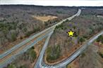 Perfect location for warehouse distribution center/ manufacturing in the Sullivan County Catskills! Strategically positioned for enormous exposure fronting both the entrance ramp to State Rt 17 (I-86) as well as the Interstate itself. Easy access with large frontage also on municipal roadway for trucks/ vehicles ingress and egress. Frontage also allows for possible subdivision if desired. The high visibility and potential access to municipal sewer (to be verified) make this a perfect site for a hotel, affordable housing units, apartment complex, as well as a warehouse facility, etc. (subject to approvals). Land is mostly level with some slope. Abutting the Monticello Raceway property and a short drive to the Center for Discovery and The Catskill Regional Medical Center in Harris, which are two very large employers in the county. Minutes to Monticello business district, shopping, busy intersections, Catskills Resort World Casino, Yoga Center and Kartrite Water Park. Bethel Woods is 10-15 minutes away. This is a fabulous location! Additional Information: SoilType:Unknown,