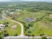 Discover the development potential of this expansive 11-acre vacant lot located at 225 Village Dr in Florida, NY. This unique parcel offers ample space for a variety of uses, with all essential utilities (sewer, water, gas) readily available. The lot was previously deemed buildable, although it&rsquo;s recommended to verify and update any necessary permits or requirements with the village of Florida. Embrace the natural beauty of the property with private ponds, including wetlands, while enjoying the convenient location within reach of major highways, shopping, dining, and recreation. Whether you envision a dream home, this prime piece of land holds endless possibilities. Don&rsquo;t miss your chance to own this slice of Florida, NY.