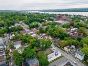 This one-of-a-kind opportunity to own 4 lots in the heart of Newburgh, NY. Former lumberyard / Sawmill for sale. Includes 3, 824 sq ft building with multiple bays and industrial door that accommodates trucks. Remarkable opportunity to own a 12, 000+ corner lot, conveniently located a block from Broadway! Inquire regarding the preliminary plans to convert into a 4-story, mixed-use complex with 88 apartment units and commercial spaces on the ground floor! No ARC approval is needed. Situated in the bustling New York area, this location offers prime accessibility and exposure. Walking Distance to downtown services and amenities. off 17K; 5 mins to I-84, 10 mins to Beacon Metro-North and Stewart Airport, 75 mins to NYC. Bring this business to this prime location in the City of Newburgh. RL Zoning. Also, available to purchase with the adjacent 5, 250 sq ft parcel (70 Van Ness St, MLS #6301761). Investors and business owners, seize this golden opportunity to maximize your returns in the thriving Newburgh real estate market. Contact for a private tour and discover the potential of this remarkable property.