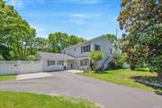 Welcome to 30 Lakeside Drive, Located in the Heart of Ronkonkoma. This Beautiful Farm Ranch Home Boasts 6 Bedrooms & 2.5 Baths, Updated Kitchen w/ New Floors, Stainless Steel Appliances, Plenty of Cabinets, Formal Living Room w/ Bay Window, Dining Room, Sliders leading out to Private Gazebo Area, Decks, Play-Set Area, Fire-Pit Area, Large Garden Area & Shed. Additionally, This Home has Potential Rental Income w/ Proper Permits, Primary Bedroom on Main Level w/ En-Suite, Walk-In Closet and Bay Window, Separate LR/DR w/ Side Entrance, Private Laundry Room, Water Heater is New, Oil Burner is 9 Years Young, Electric Service was Updated in 2015 & Roof/Siding is 12 Years Young. This Home is located on a Cul-de-sac. Make Wonderful Summer Memories as you Gather Around the Fire-Pit and Roast Marshmallows.