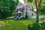 An authentic 1894 Victorian home, located steps from Huntington Village, is a stunning example of historic architecture from the late 19th century. This charming residence boasts intricate hand-carved mantles that serve as focal points in the living spaces, showcasing the craftsmanship and attention to detail of the era. The interior features original carved southern pine walls and coffered ceilings, adding warmth and character to each room. The rich patina of the wood contributes to the overall ambiance of the home, creating a cozy and inviting atmosphere for residents and guests alike. One of the standout features of this Victorian home is its rocking chair front porch, a quintessential element of Southern architecture that offers a serene space to relax and enjoy the surrounding scenery. From the porch, residents can take in views of the meticulously maintained garden. This 1894 4 bedroom Victorian home is a true gem that seamlessly blends historical charm with modern comfort. Its unique architectural details, virtually impossible to reproduce set it apart as a timeless and elegant residence in a picturesque setting.